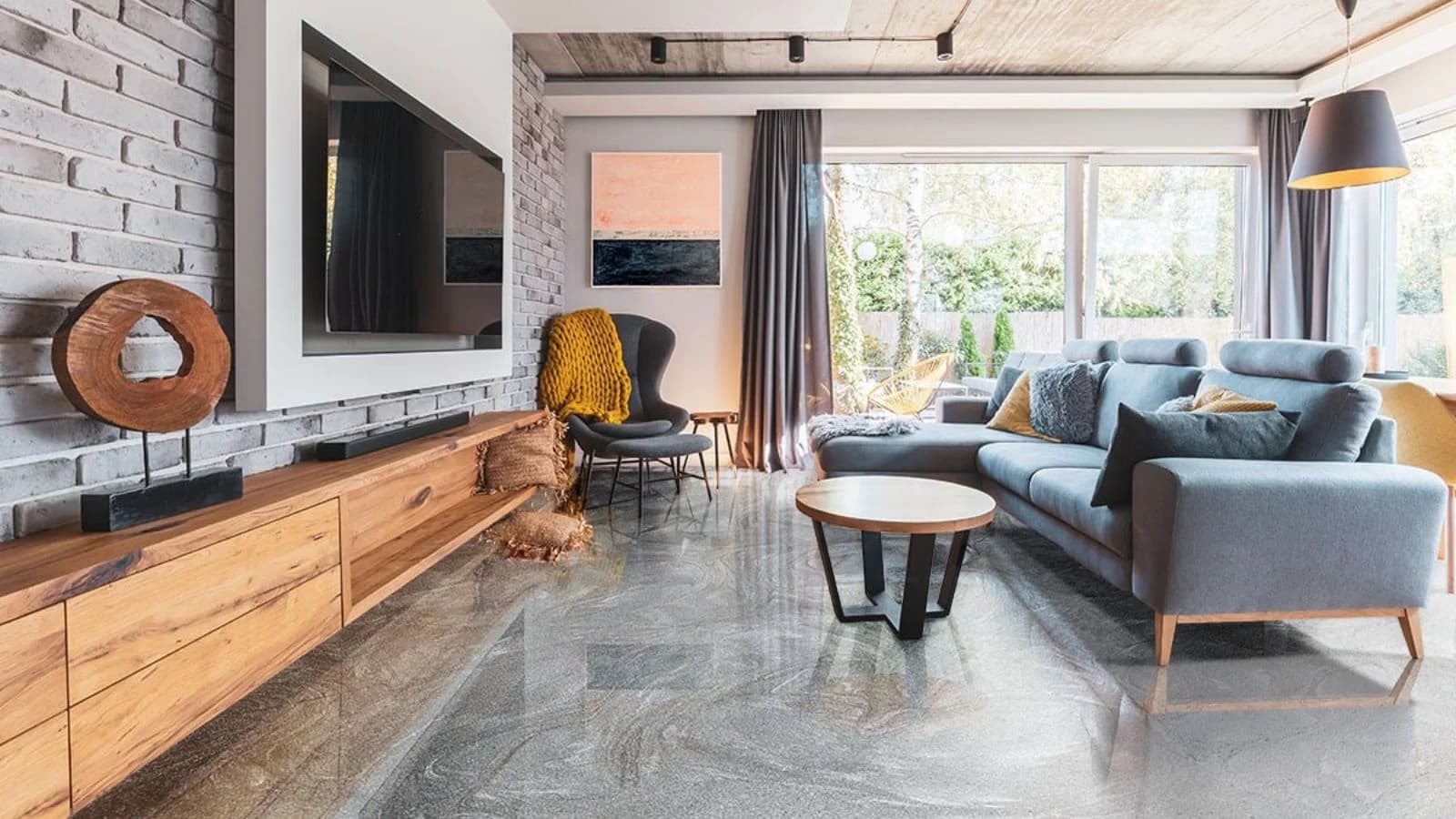 Epoxy flooring in a modern living room in Saudi Arabia with a glossy finish.
