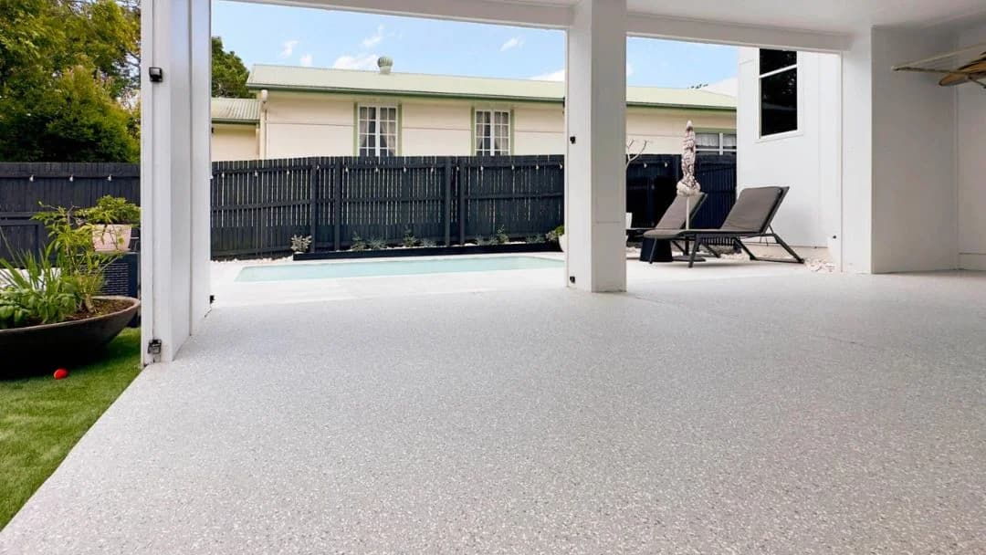 Epoxy flooring on an outdoor patio area in Saudi Arabia with a smooth decorative finish.