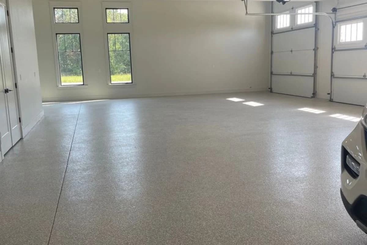 Epoxy garage flooring in Madinah with light grey textured finish