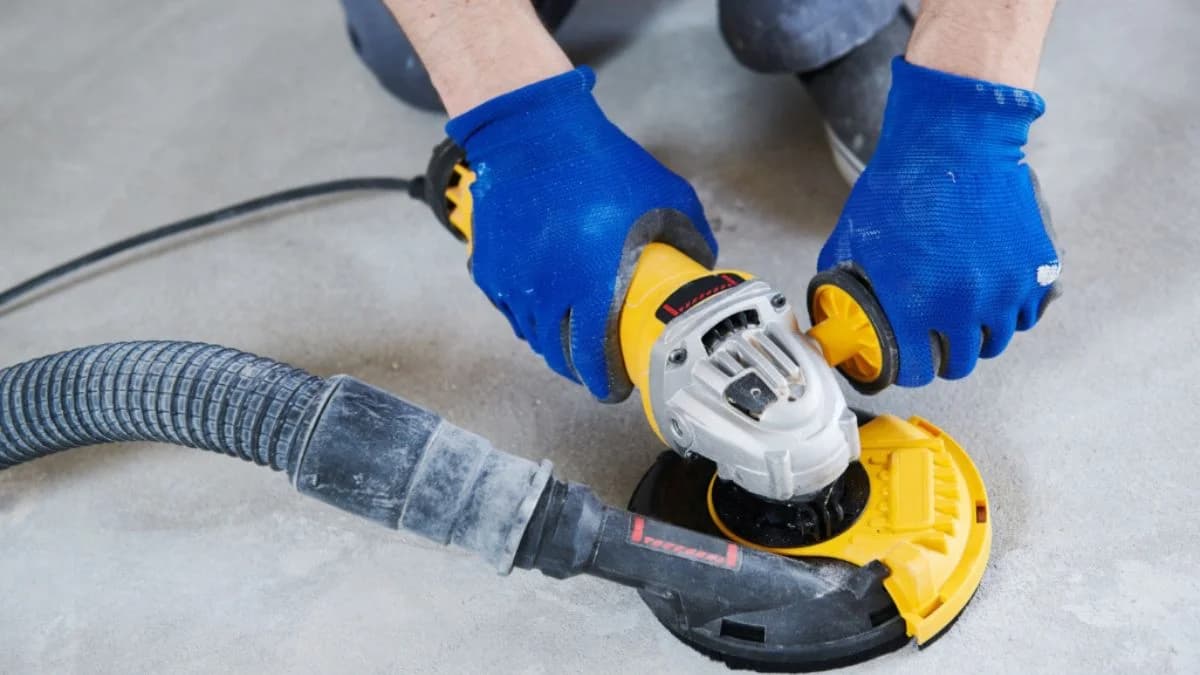 Detailing and smoothing microcement surface with sander