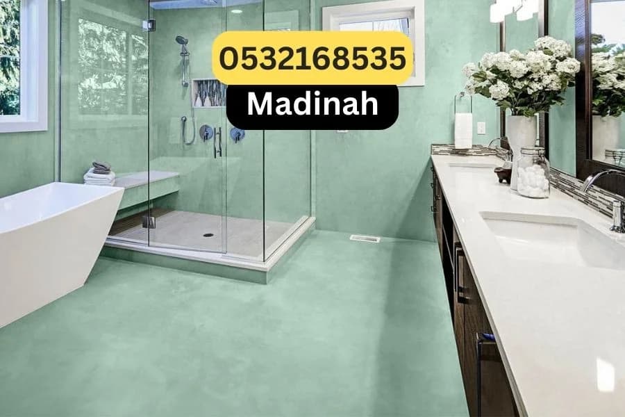 Green microcement bathroom floor in Madinah