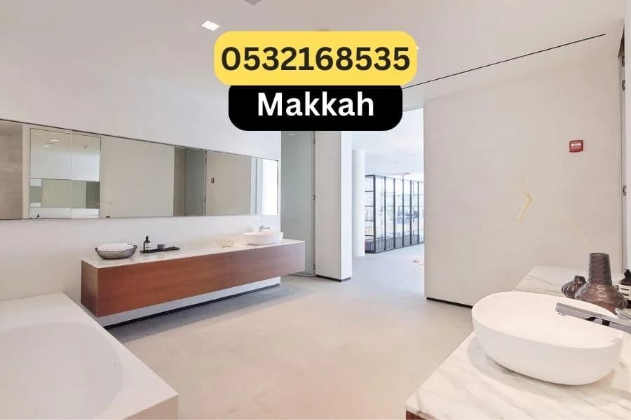 Modern bathroom with microcement floor in Makkah