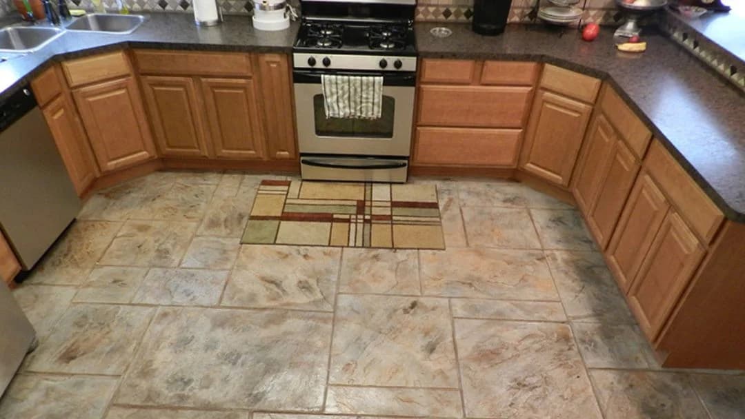 Stamped concrete kitchen flooring in Saudi Arabia with natural stone look