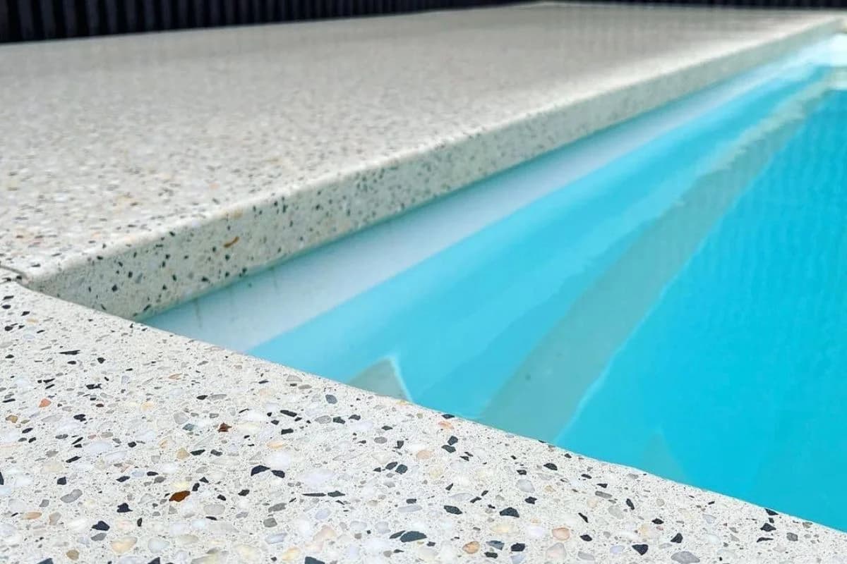Commercial office space with seamless white terrazzo flooring and minimal design in Madinah, Saudi Arabia