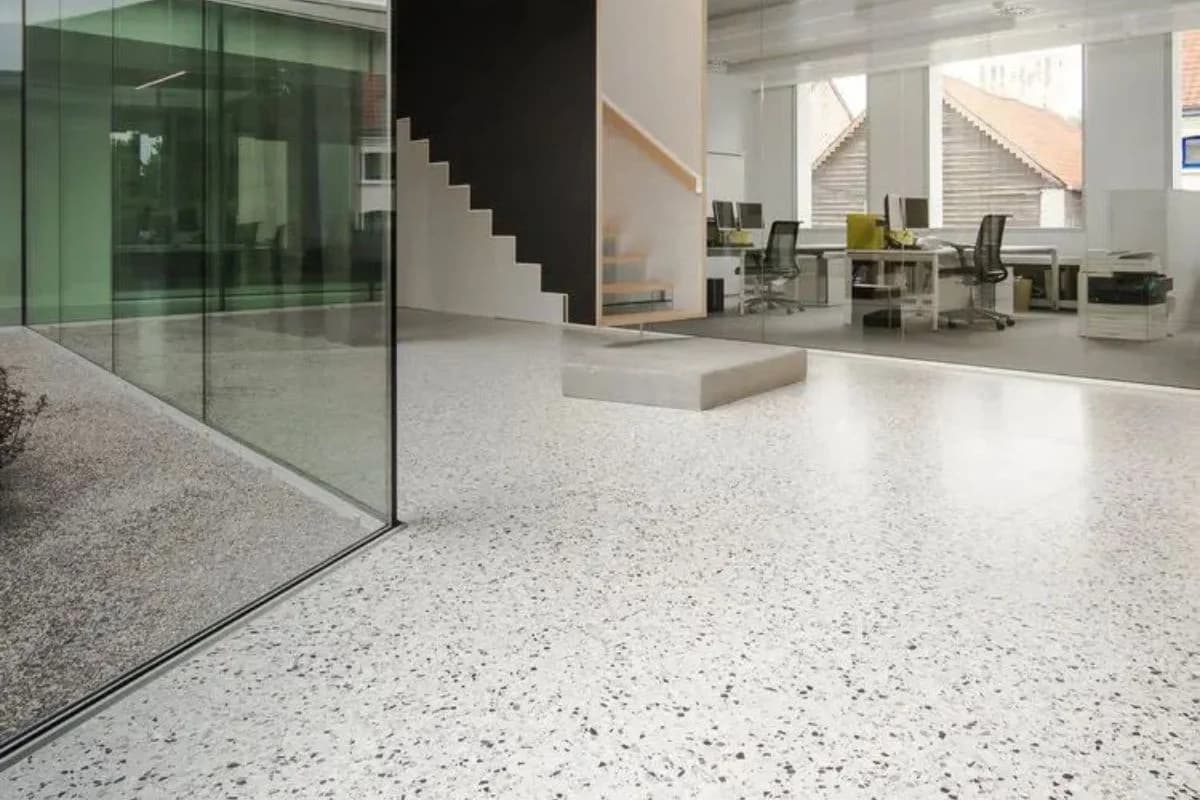 Close-up of polished terrazzo poolside flooring with exposed marble chips in Riyadh, Saudi Arabia