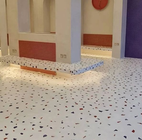 "Elegant terrazzo flooring in Riyadh living room, showcasing a polished surface with modern patterns."